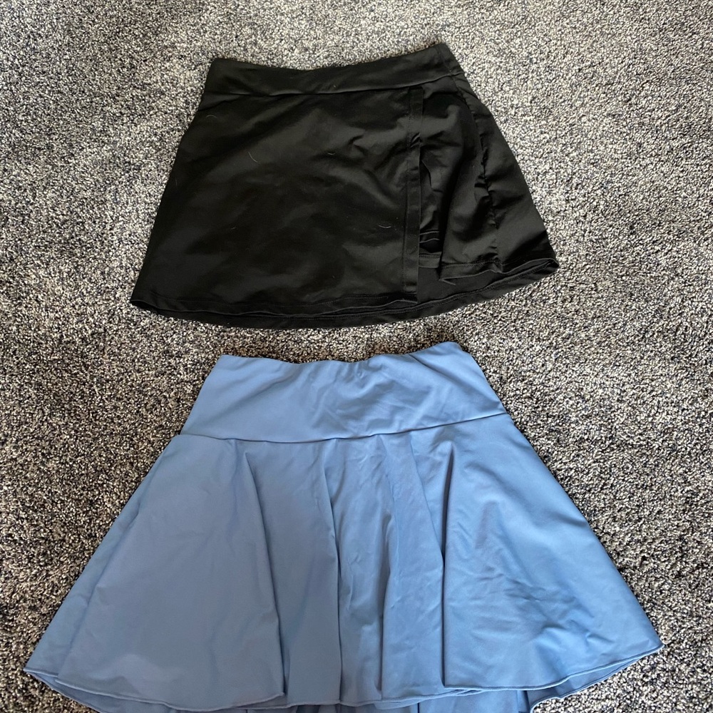 Two exercise skirts with built in shorts